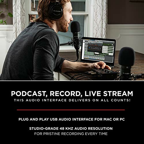 Man using audio interface for podcasting, recording, live streaming with laptop and microphone.