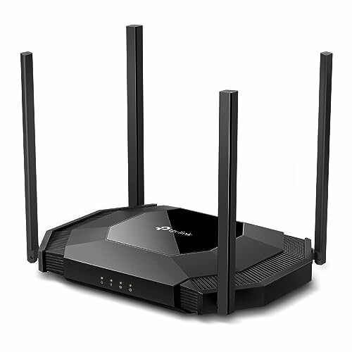 Black wireless router with four antennas