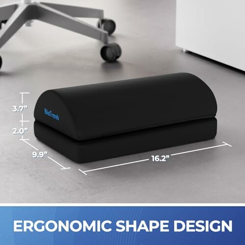 Black ergonomic foot rest with dimensions on office floor